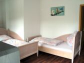 Schlafzimmer mit 2 Einzelbetten